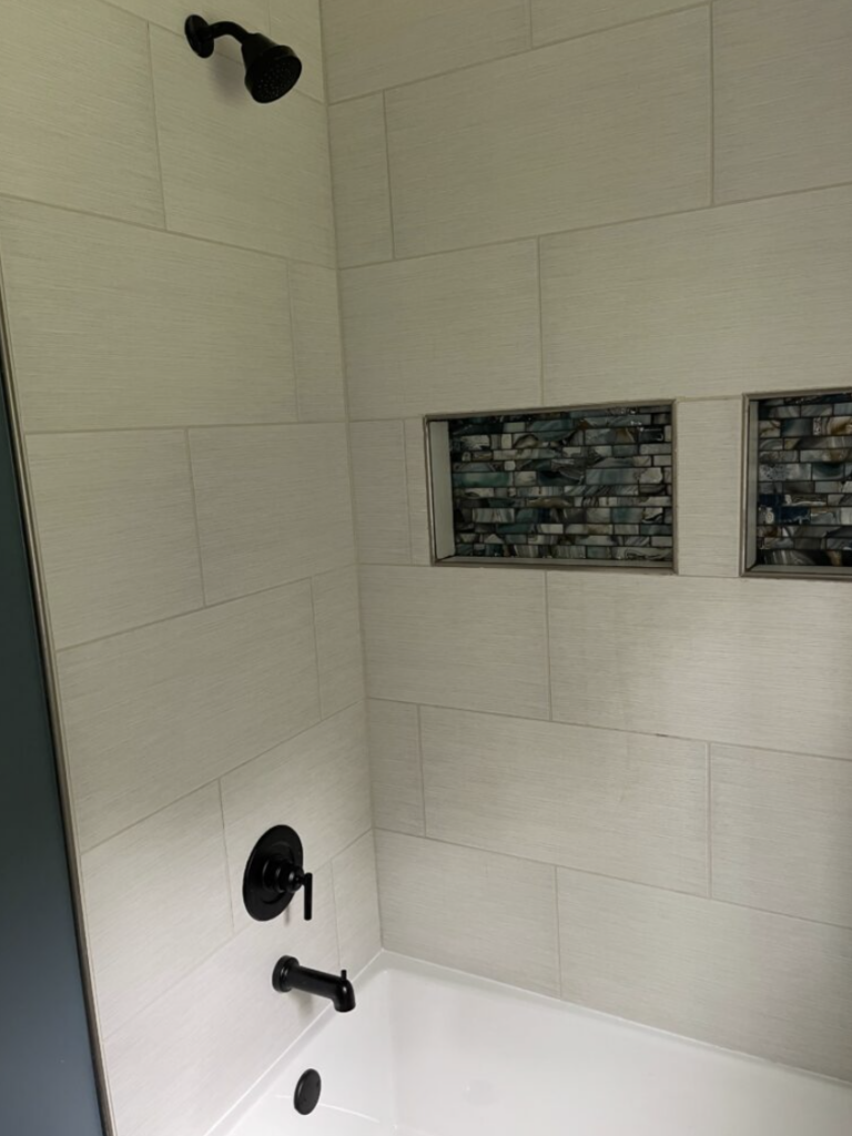 Modify Remodeling contractor installing bathroom tile in New Castle County Delaware